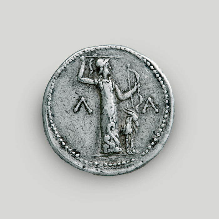 Reverse of silver tetradrachm of Cleomenes III depicting a statue of Apollo Amyklaios, a patron deity of Sparta.  Reverse of silver tetradrachm of Cleomenes III