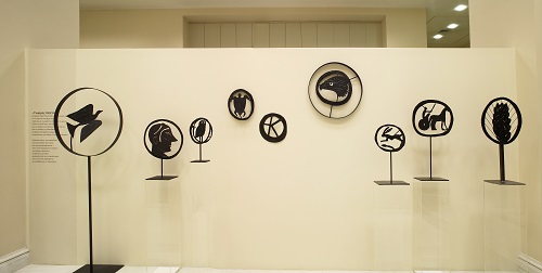 The exhibition area, with wall-mounted and free-standing sculptures by Giorgos Lappas.  “Ancient Coins in the Alpha Bank Collection. Contemporary Inspiration for the Sculpture of Giorgos Lappas” exhibits