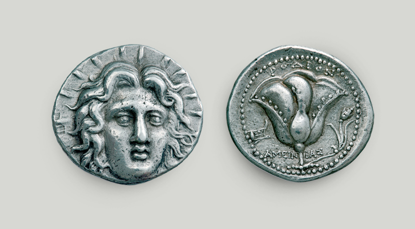 Two sides of Rhodian silver tetradrachm. On the obverse head of god Helios, on the reverse a rose, symbol of the city.  Two sides of Rhodian silver tetradrachm.