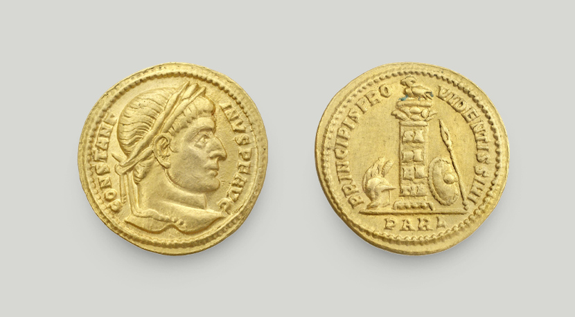 Two sides of gold solidus of Constantine the Great. On the obverse head of emperor, on the reverse column, owl, shield, spear and helmet. Two sides of gold solidus of Constantine the Great