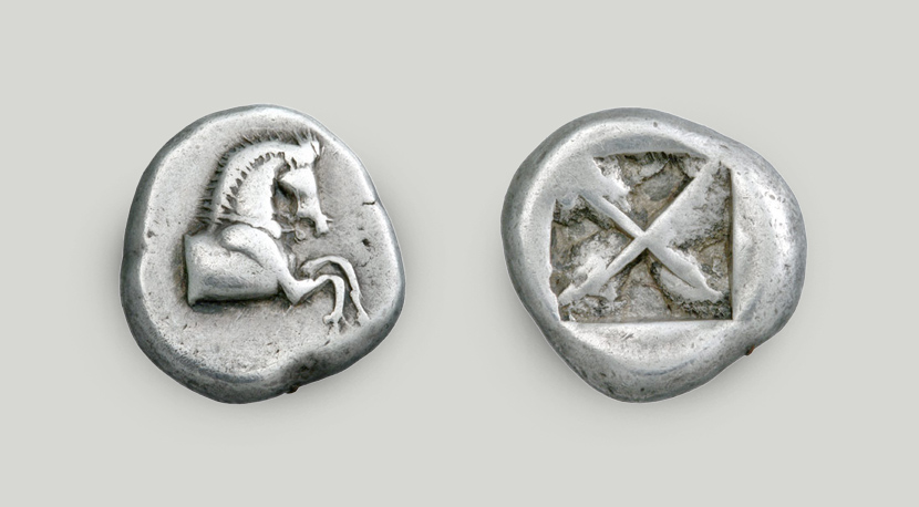 Right: on the obverse, the front part of a horse. Left: incuse square on the reverse.  Silver didrachm, Athens