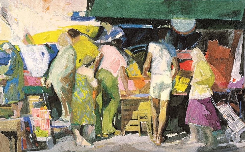 People in colourful clothes shopping at the street market on a sunny morning. 