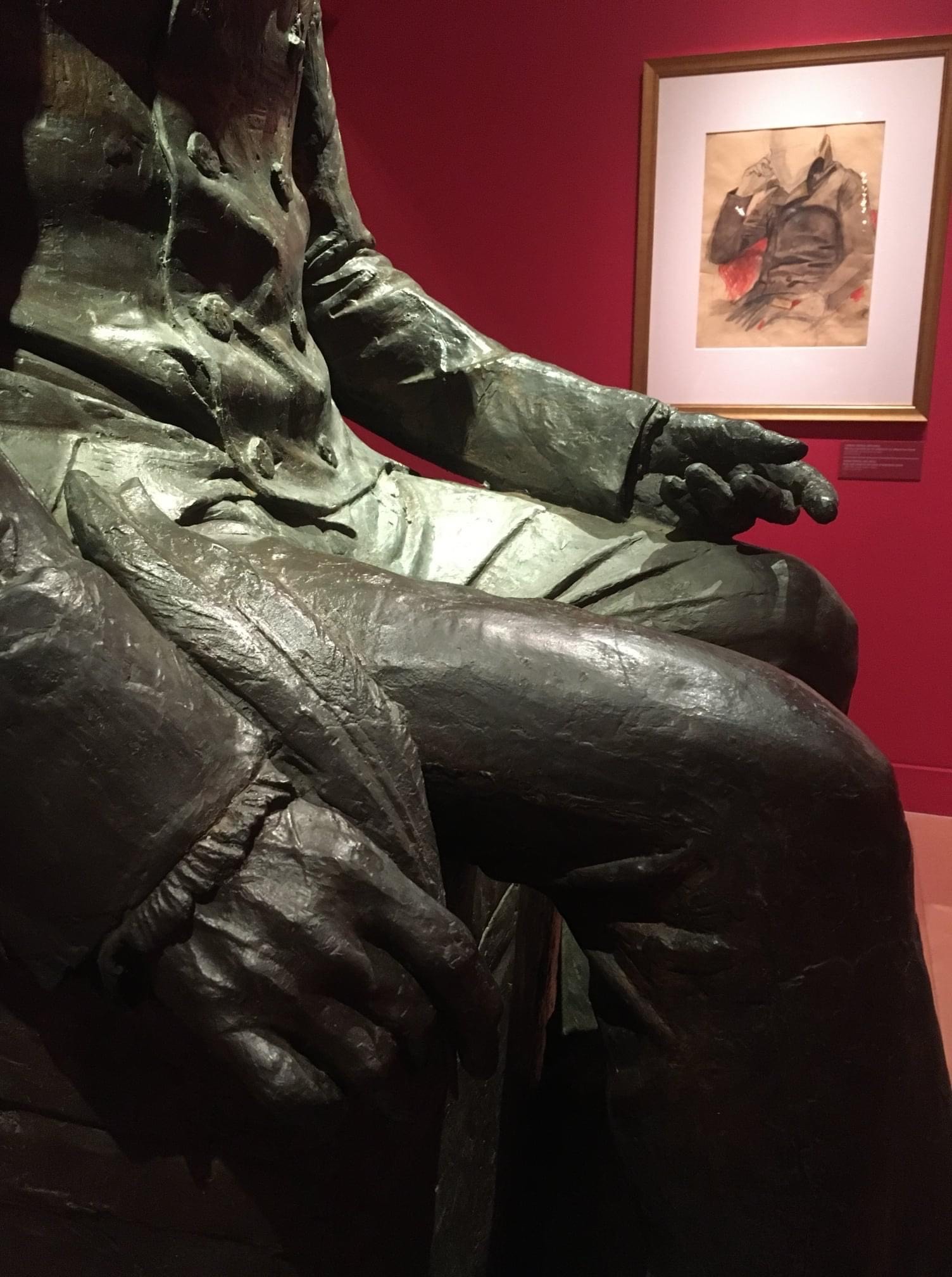 A sculpture and a painting at the back, in the exhibition “1821 Before and After”. Exhibits “1821 Before and After”