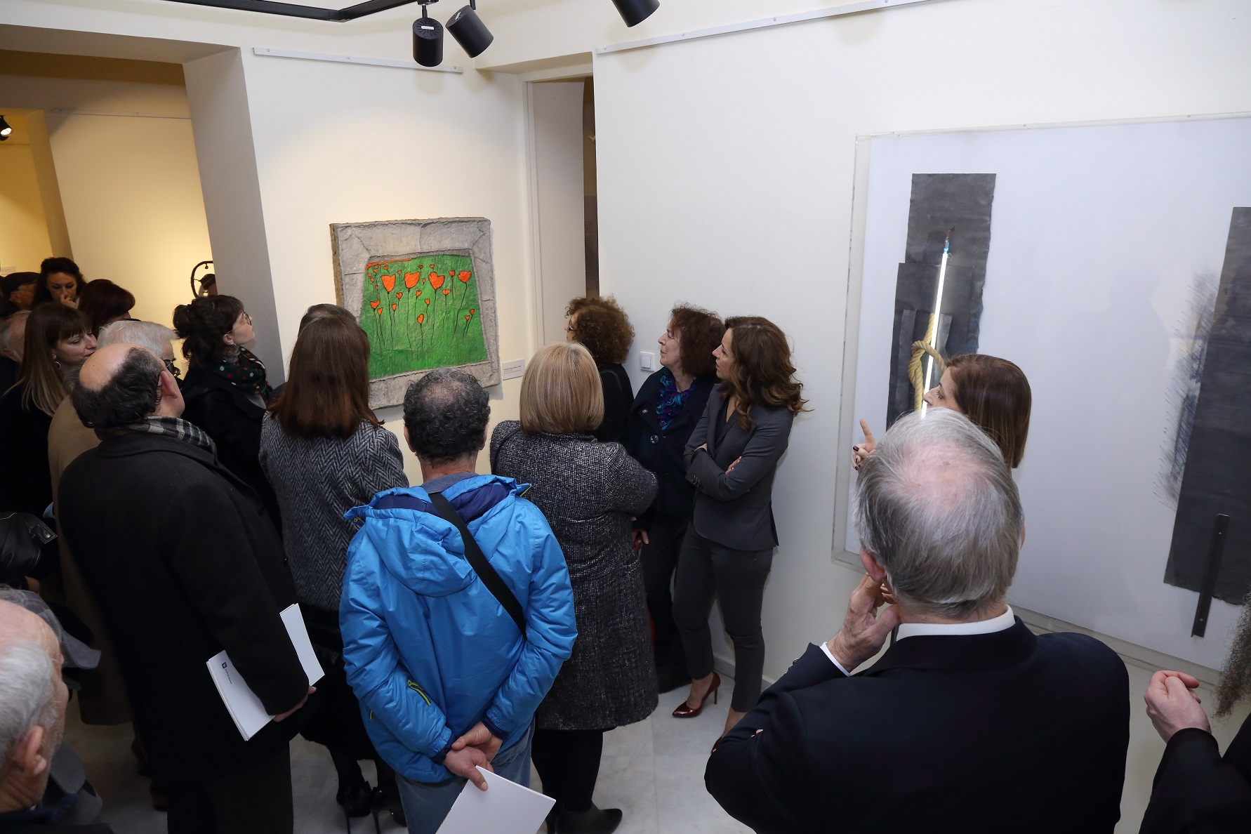 Visitors in the exhibition, looking at the exhibits.  Exhibition “The Alpha Bank Collection. Greek Art from 1950 until Today” – Ioannina