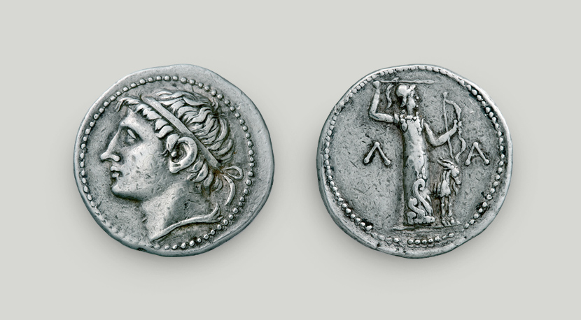 Two sides of silver tetradrachm of Cleomenes III. On the obverse head of Cleomenes, on the reverse statue of Apollo Amyklaios. Two sides of silver tetradrachm of Cleomenes III